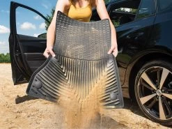 WeatherTech All-Weather Floor Mat 9 WeatherTech All-Weather Floor Mat -Auto Parts Store weathertech sand pouring from mat vw3 8